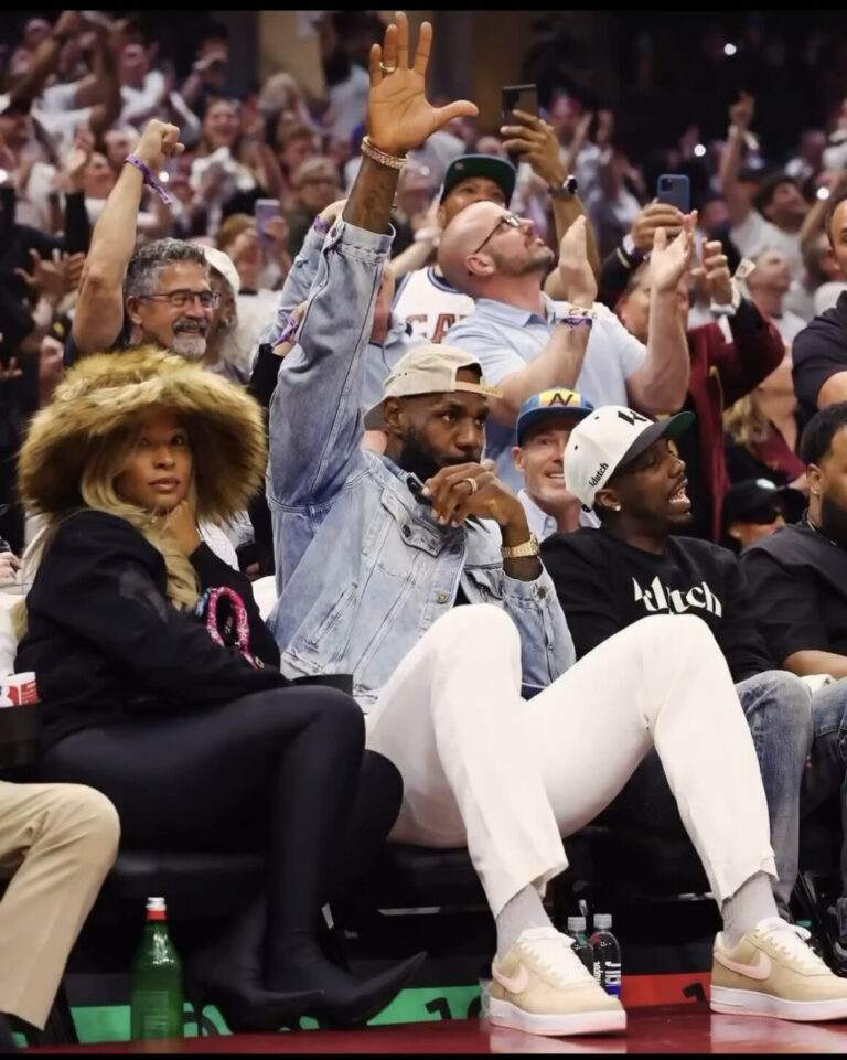 Fashion Bomb Accessories You Ask We Answer Savannah James Attended the NBA Playoffs with LeBron James in a 160 Brown Tyler Lambert Furry Bucket Hat 3 1160x1451