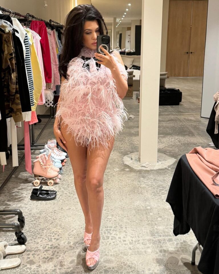 Kourtney Kardashian Delivers Drama in Feathered Pink Bodysuit 1