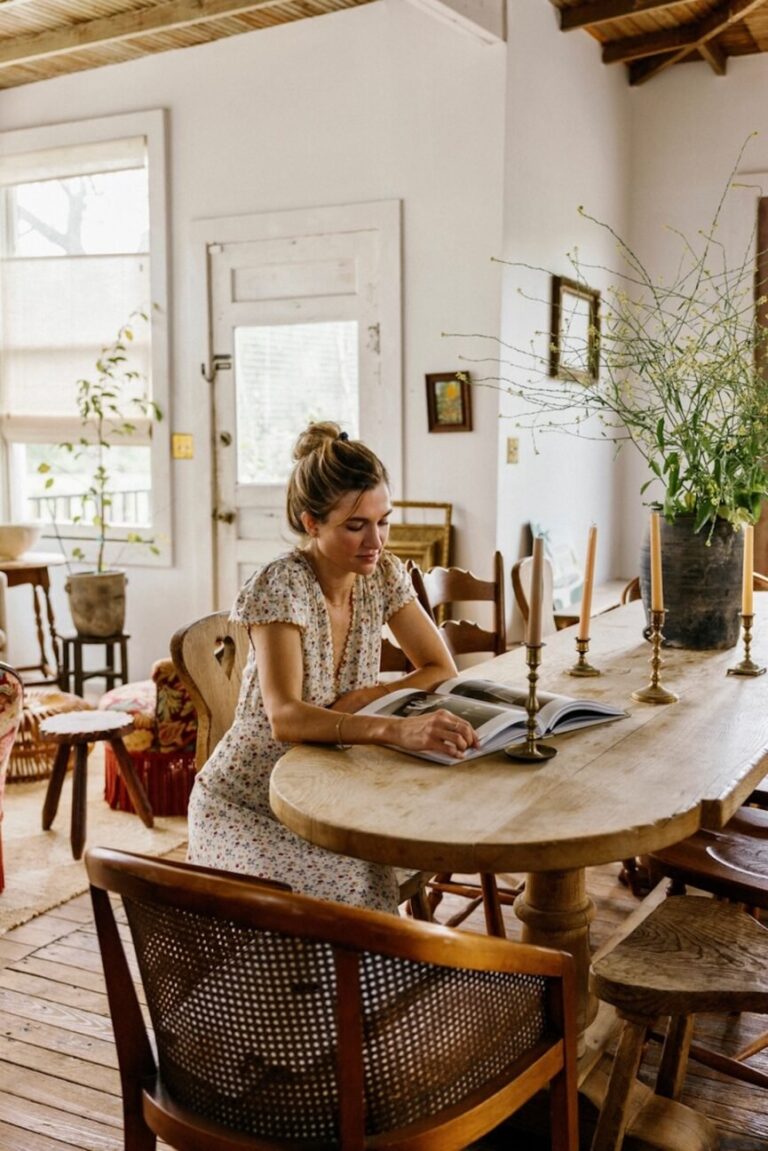 woman reading at table 865x1296