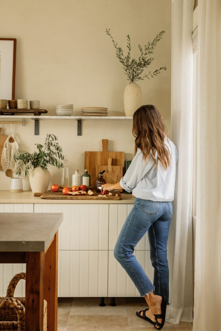 woman cooking in small kitchen 865x1296