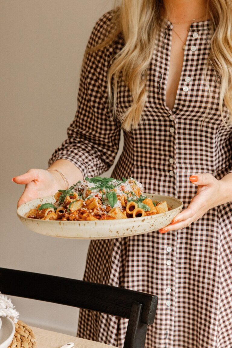 woman holding pasta 865x1297