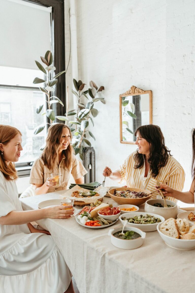 women at dinner party 865x1298