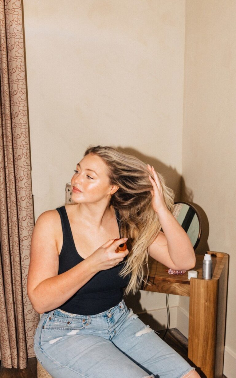 Iskra Lawrence brushing her hair 865x1385